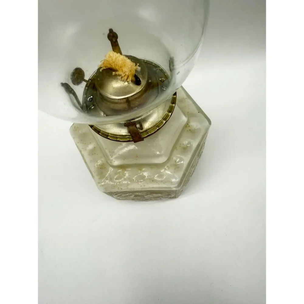 vintage oil lamp featuring a hexagonal base embossed  a horse and buggy scene
